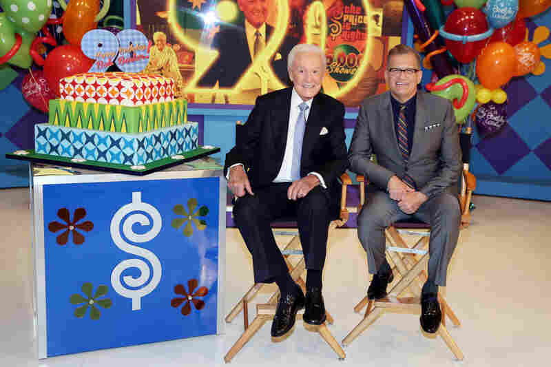 Bob Barker, left, and current The Price is Right host Drew Carey pose for a photo on set after a special appearance that celebrated Barker's 90th birthday.