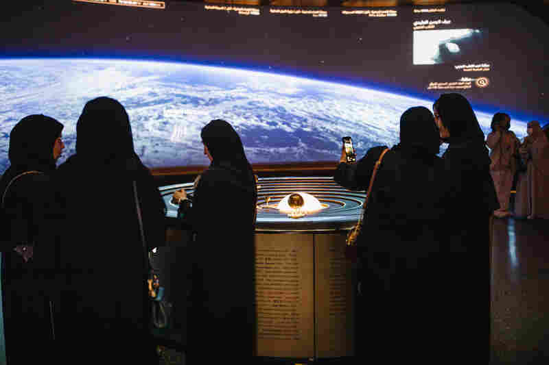 Visitors at the Museum of the Future's space expedition level. The experience aims to highlight the possibilities of human space travel in the future.