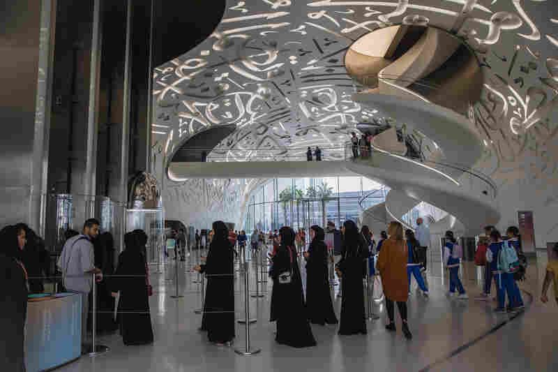 Visitors line up to take the elevator to the start of the exhibitions at the Museum of the Future.