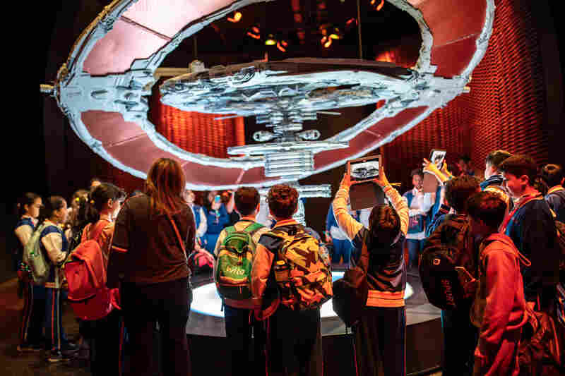 School children explore the fictional space station as part of the Museum of the Future's space exhibition. The experience aims to highlight the possibilities of human space travel in the future.